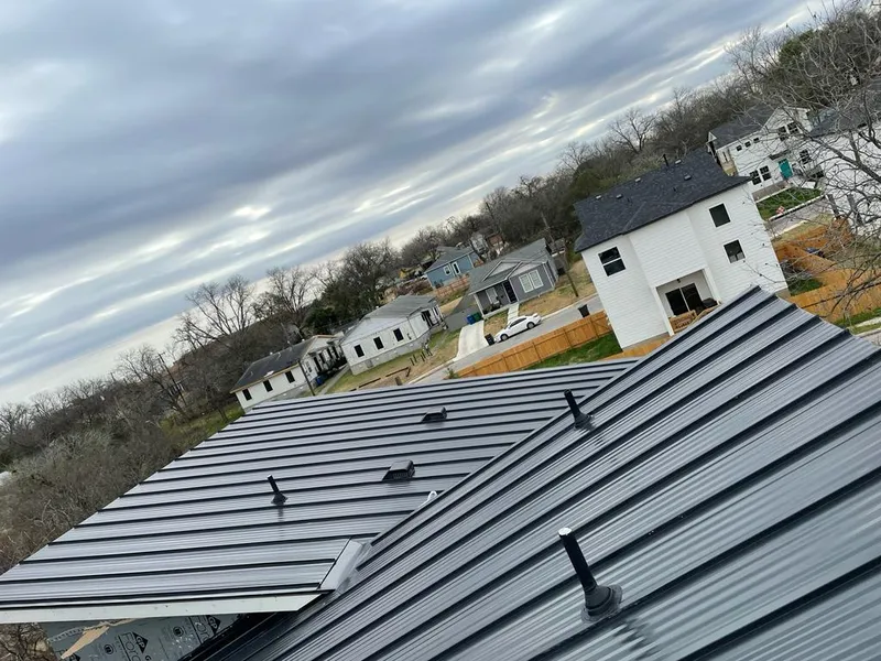 Standing seam metal roof panels with vents for Skylight Repair in Alpine